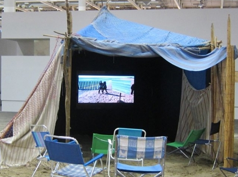Agnès Varda, The Cabana on the Beach (which is also a projection booth), 2010