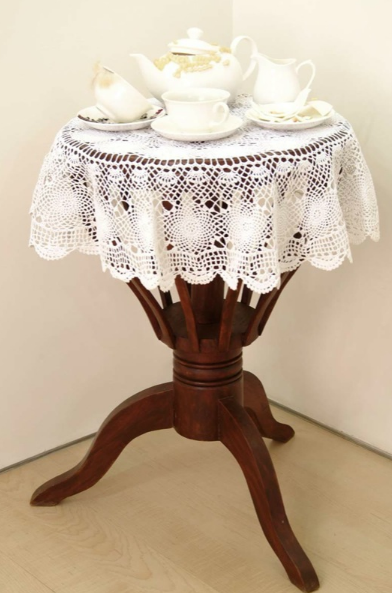 Bharti Kher, The Girl with the Hairy Lips said No, 2006, wooden table, hair, bindis, crochet, cotton, ceramic, teeth, cream,
