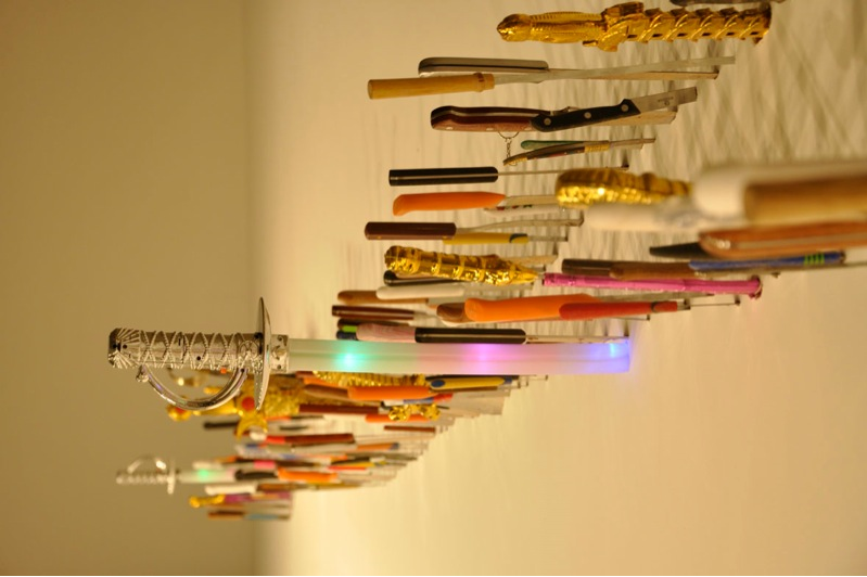 Farhard Moshiri, Shukran, 2011, knives, 1388 x 520 cm, installation at the Third Line, Dubai