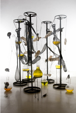 Tunga, Cooking crystals, 2006-2009, iron, steel, crystal, magnets, brown matter, yellow liquid and glass