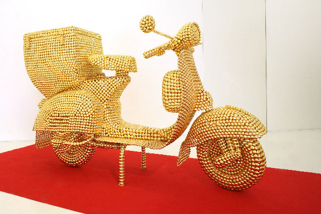 Valay Shende, Scooter, 2007, gold plated metal discs,